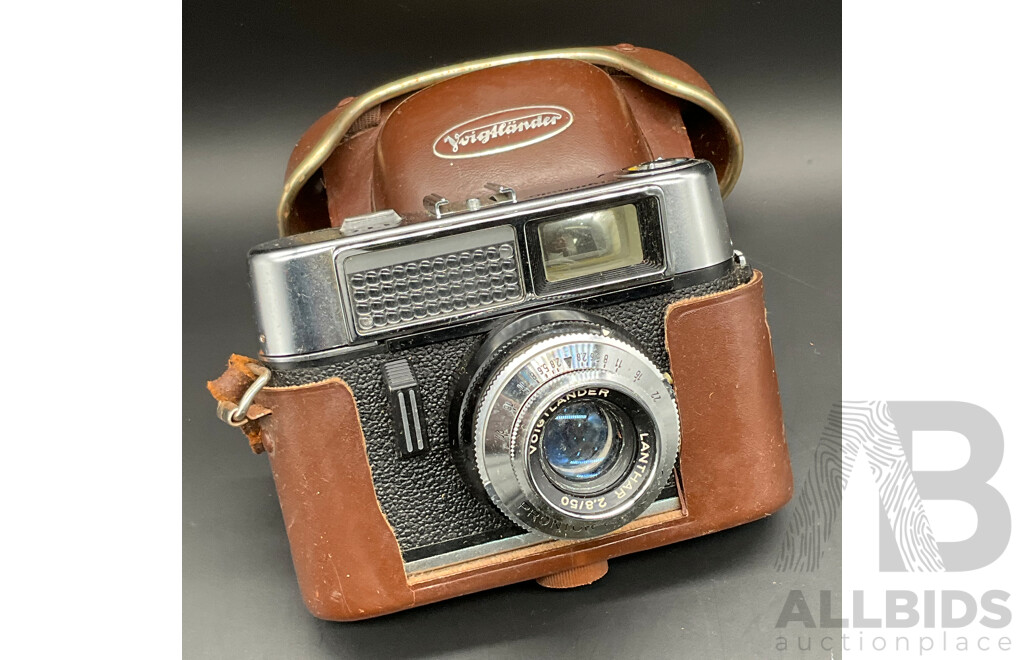 Vintage Film Cameras, Including VOIGTLANDER, CANON Canonet and SKYMASTER - Lot of 3