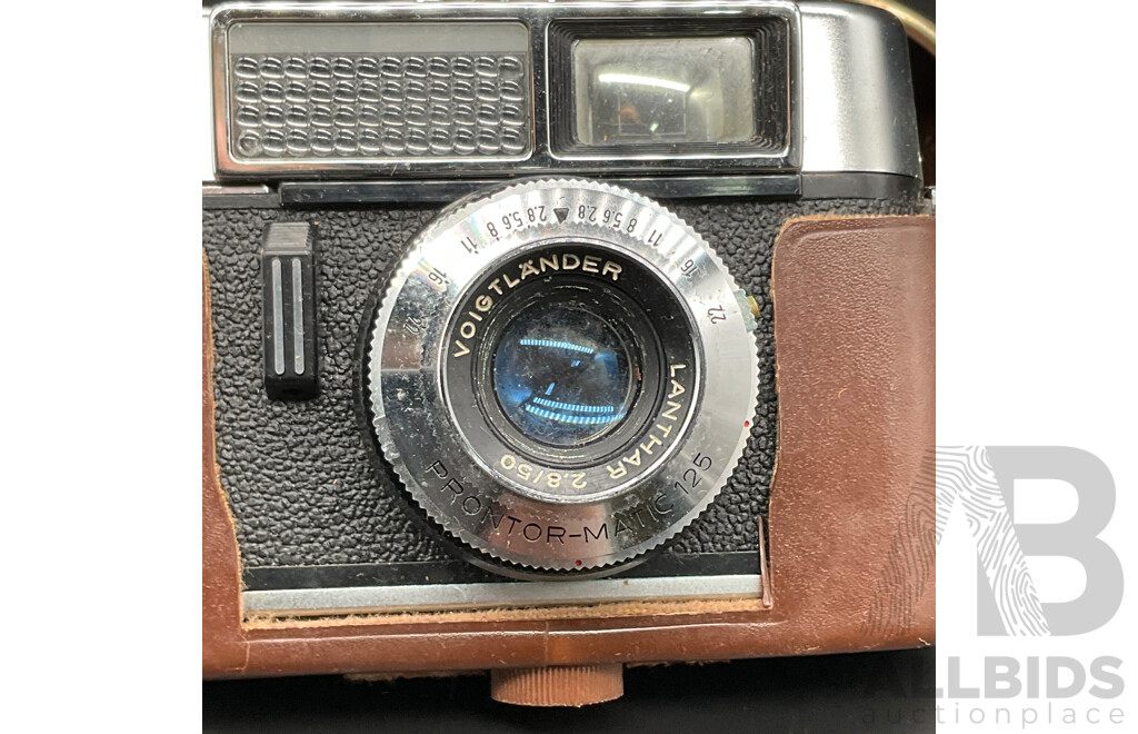 Vintage Film Cameras, Including VOIGTLANDER, CANON Canonet and SKYMASTER - Lot of 3