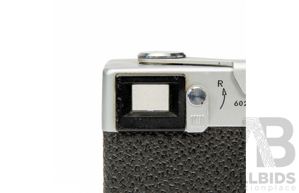 Rollei 35 Silver Compact 35mm Film Camera with First Edition Guide