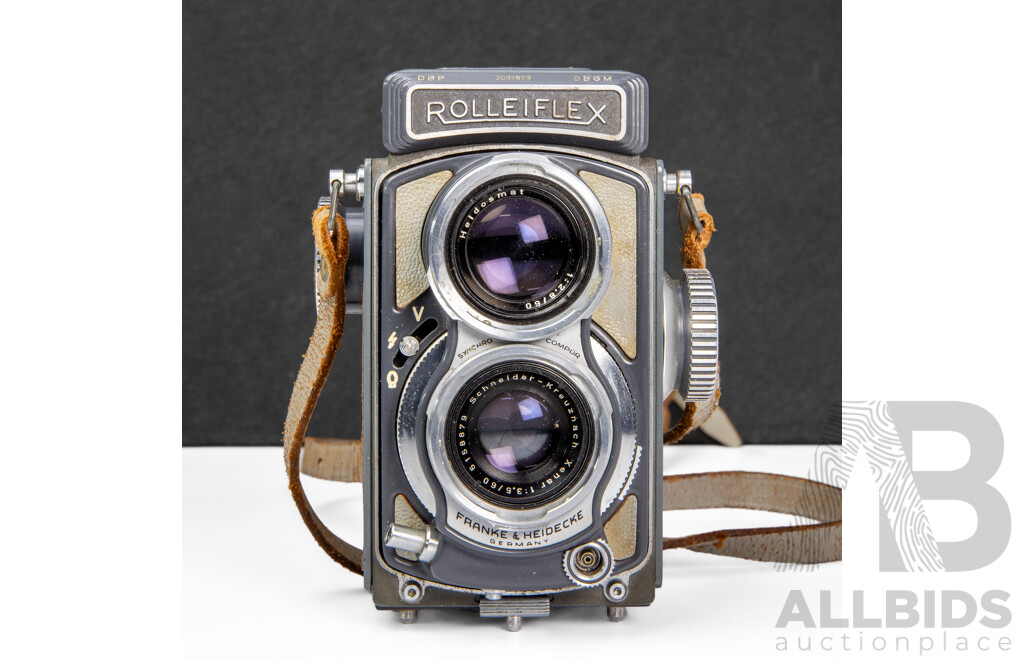 Grey Rolleiflex 4×4 Baby TLR Camera with Xenar 60mm F/3.5 Lens and Rollei Lens Hood