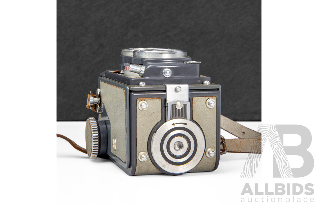 Grey Rolleiflex 4×4 Baby TLR Camera with Xenar 60mm F/3.5 Lens and Rollei Lens Hood