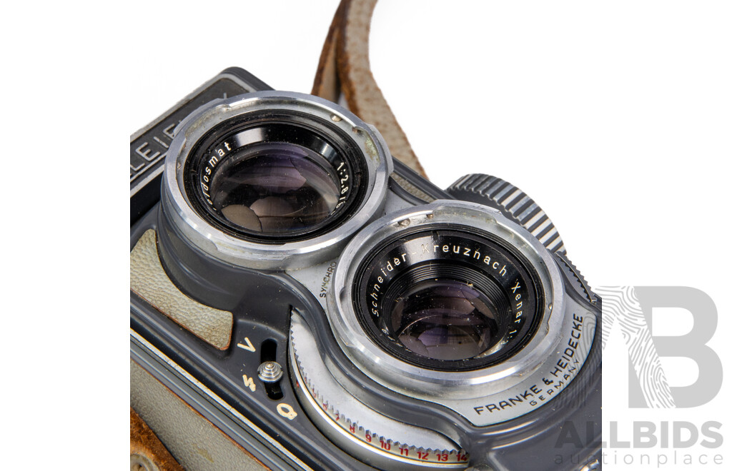 Grey Rolleiflex 4×4 Baby TLR Camera with Xenar 60mm F/3.5 Lens and Rollei Lens Hood