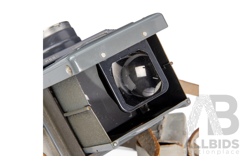 Grey Rolleiflex 4×4 Baby TLR Camera with Xenar 60mm F/3.5 Lens and Rollei Lens Hood
