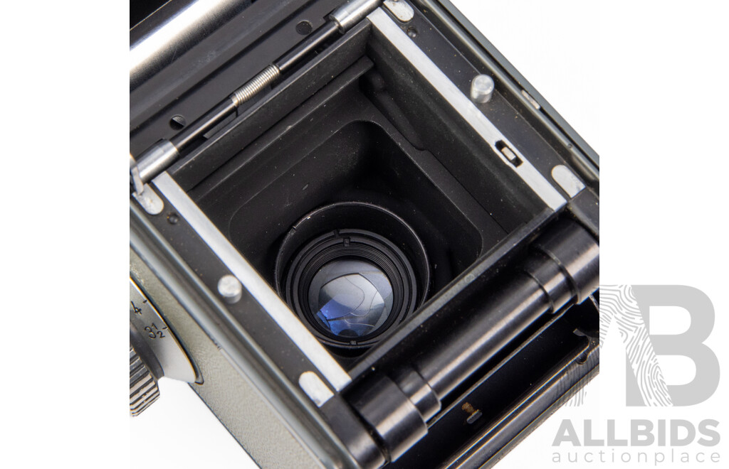 Grey Rolleiflex 4×4 Baby TLR Camera with Xenar 60mm F/3.5 Lens and Rollei Lens Hood