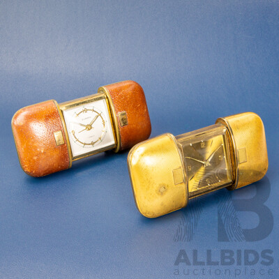 Pair of Vintage Europa Eight Day Travelling Alarm Clocks