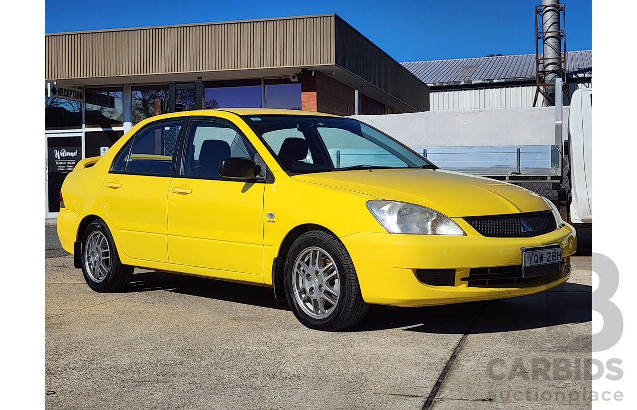 7/2007 Mitsubishi Lancer ES CH MY07 4d Sedan Yellow 2.4L