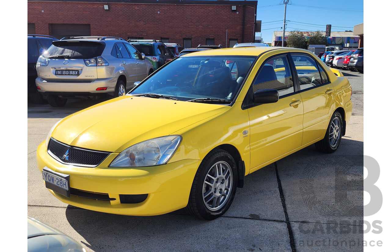 7/2007 Mitsubishi Lancer ES CH MY07 4d Sedan Yellow 2.4L