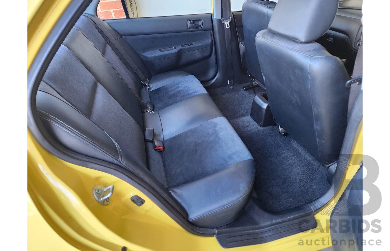 7/2007 Mitsubishi Lancer ES CH MY07 4d Sedan Yellow 2.4L