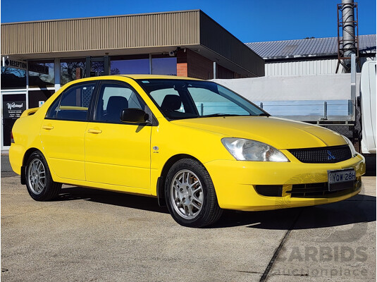 7/2007 Mitsubishi Lancer ES CH MY07 4d Sedan Yellow 2.4L