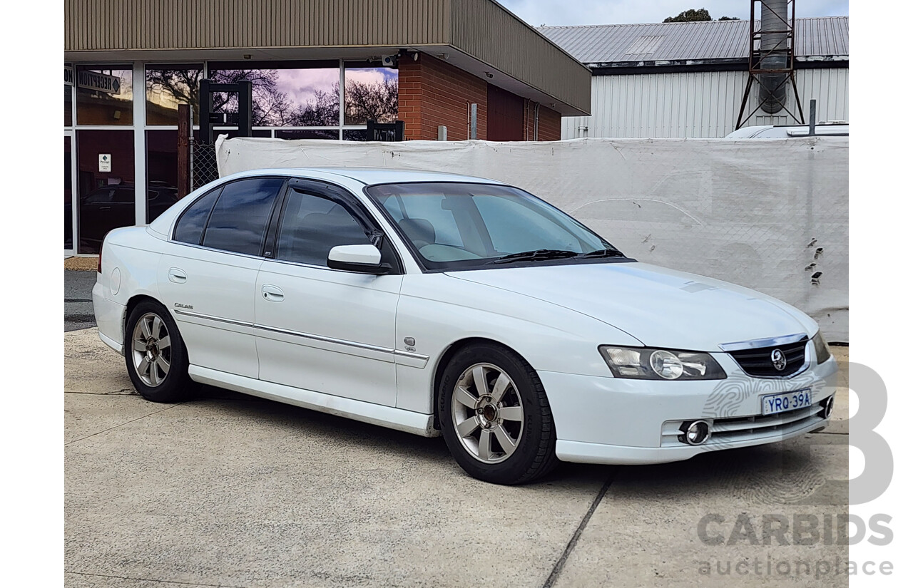 9/2002 Holden Calais VXII 4d Sedan White 3.8L