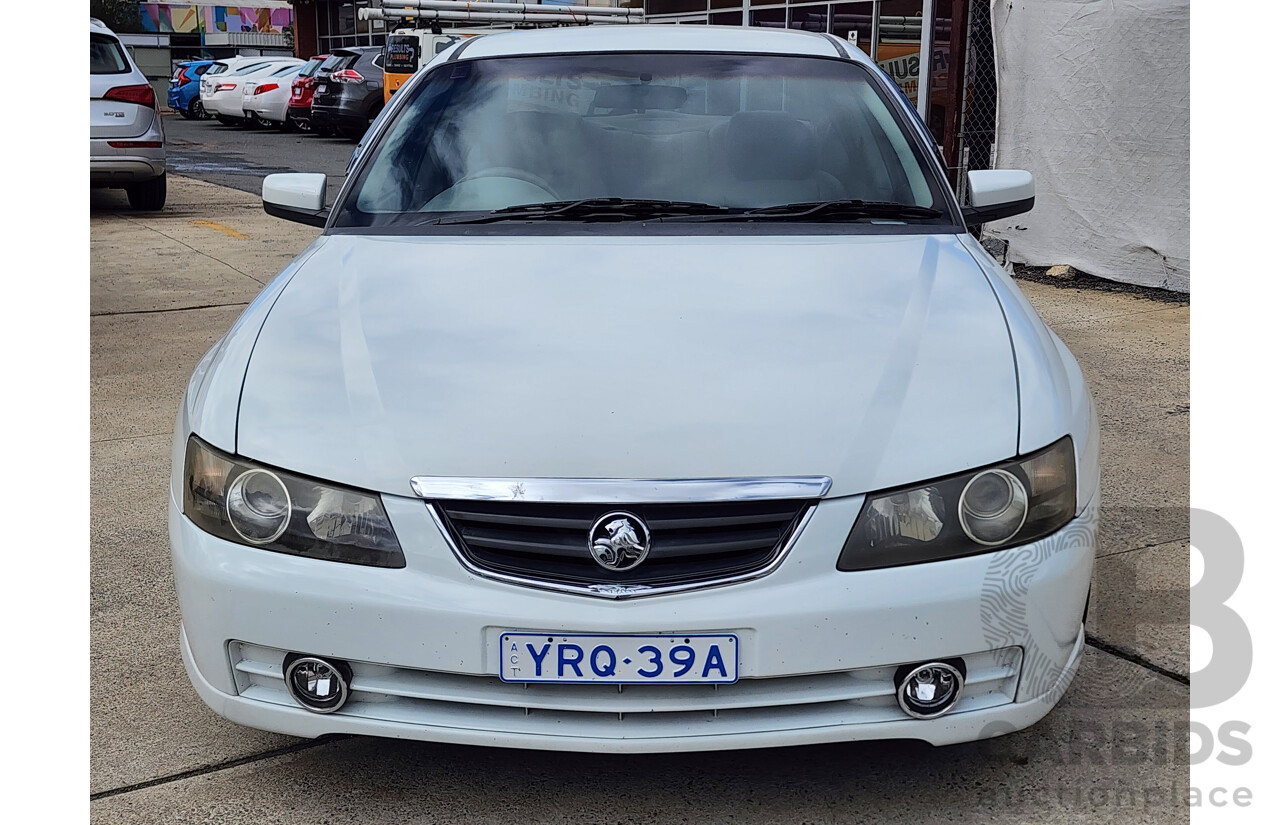 9/2002 Holden Calais VXII 4d Sedan White 3.8L