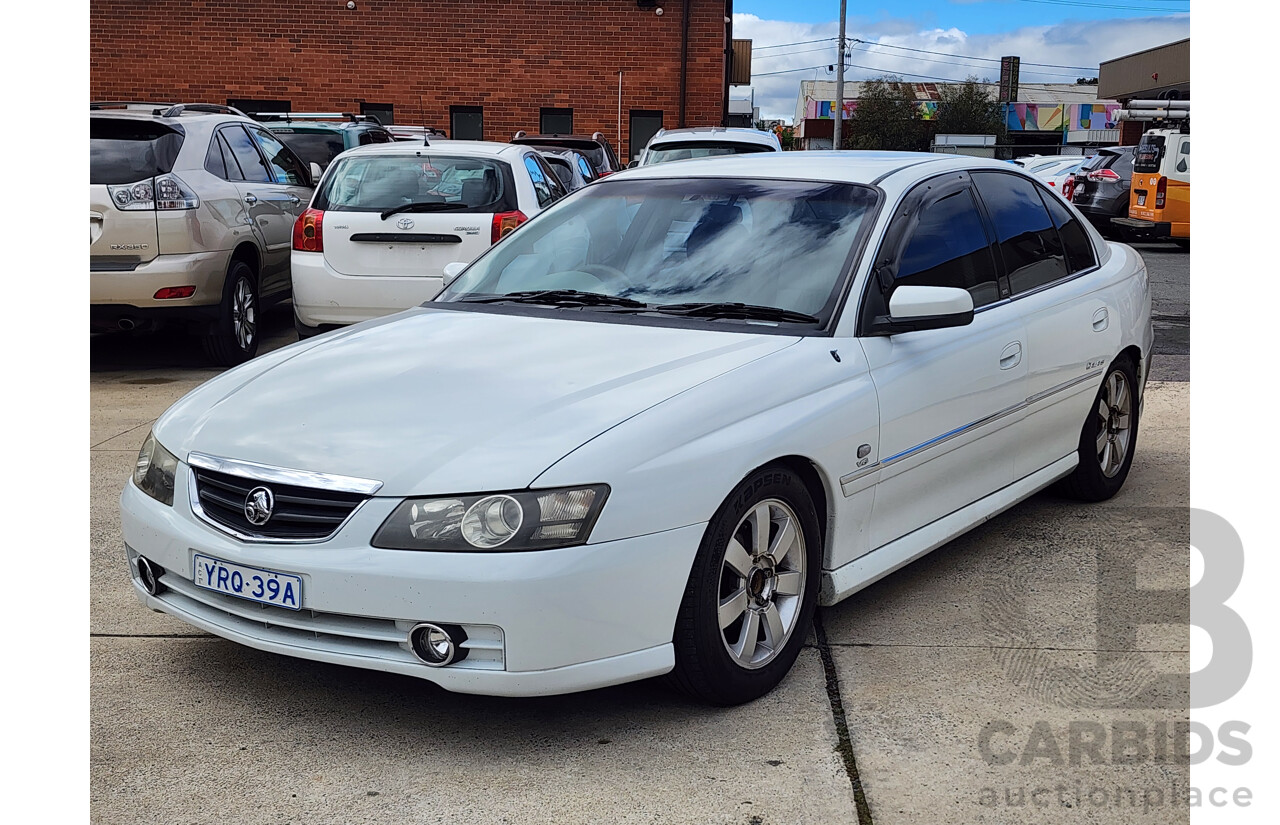 9/2002 Holden Calais VXII 4d Sedan White 3.8L