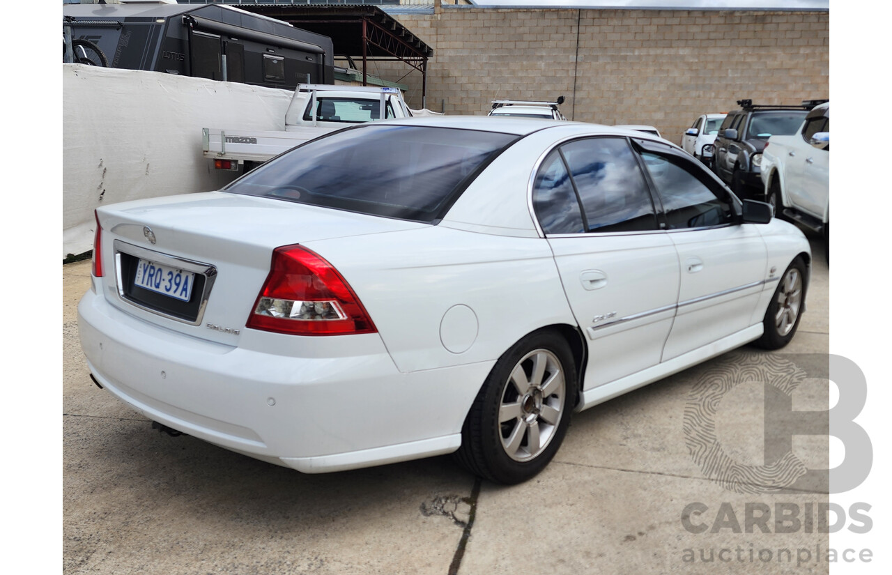 9/2002 Holden Calais VXII 4d Sedan White 3.8L