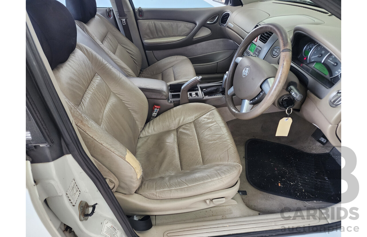 9/2002 Holden Calais  VXII 4d Sedan White 3.8L
