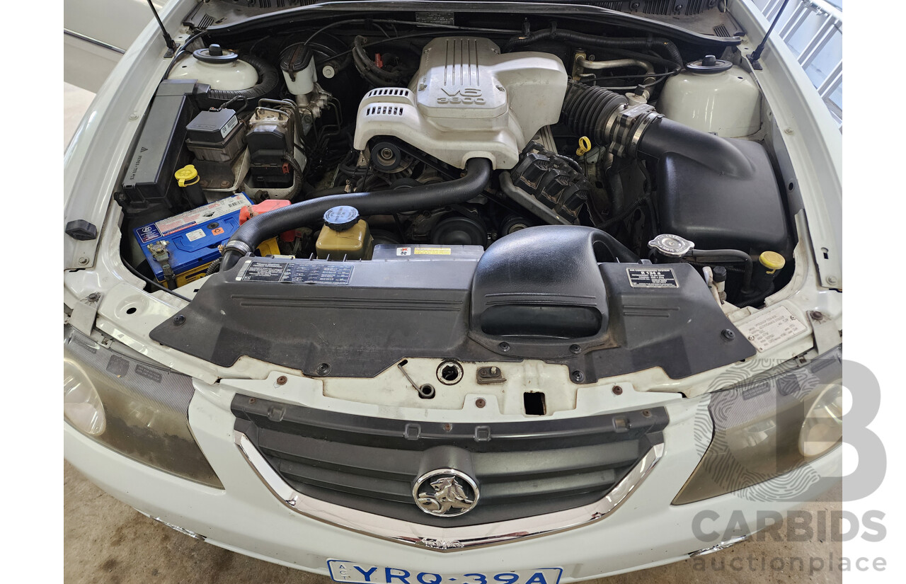 9/2002 Holden Calais  VXII 4d Sedan White 3.8L