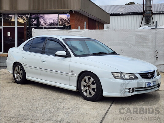 9/2002 Holden Calais  VXII 4d Sedan White 3.8L