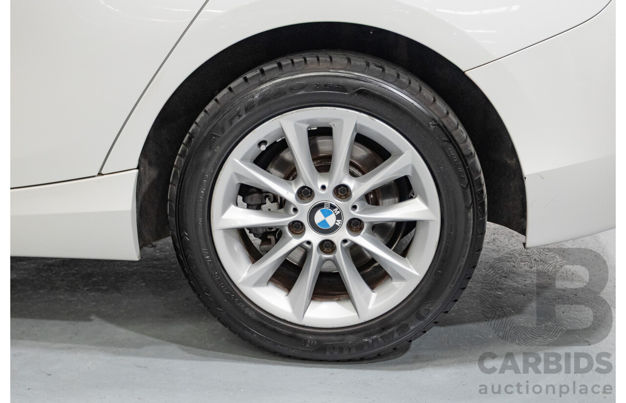 2/2015 BMW 116i Urban F20 MY15 5d Hatchback Alpine White Turbo 1.6L
