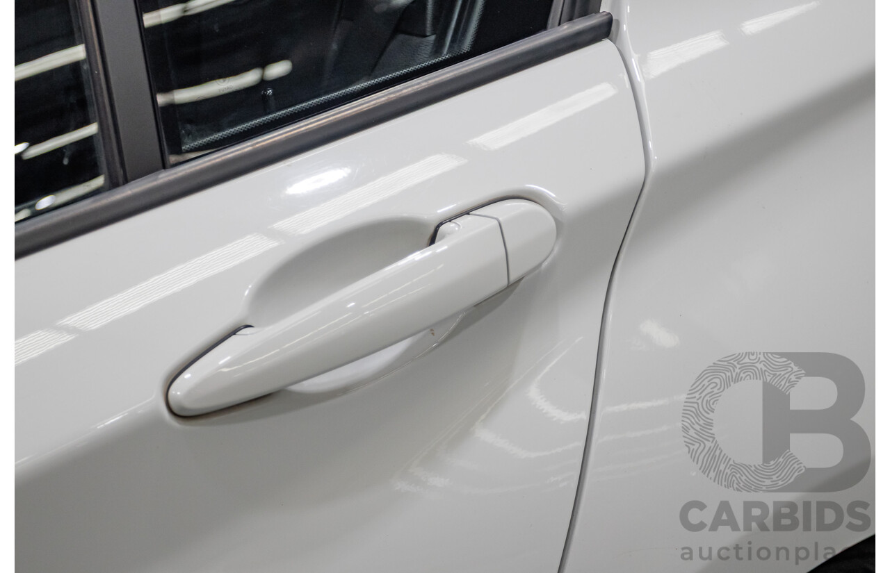 2/2015 BMW 116i Urban F20 MY15 5d Hatchback Alpine White Turbo 1.6L