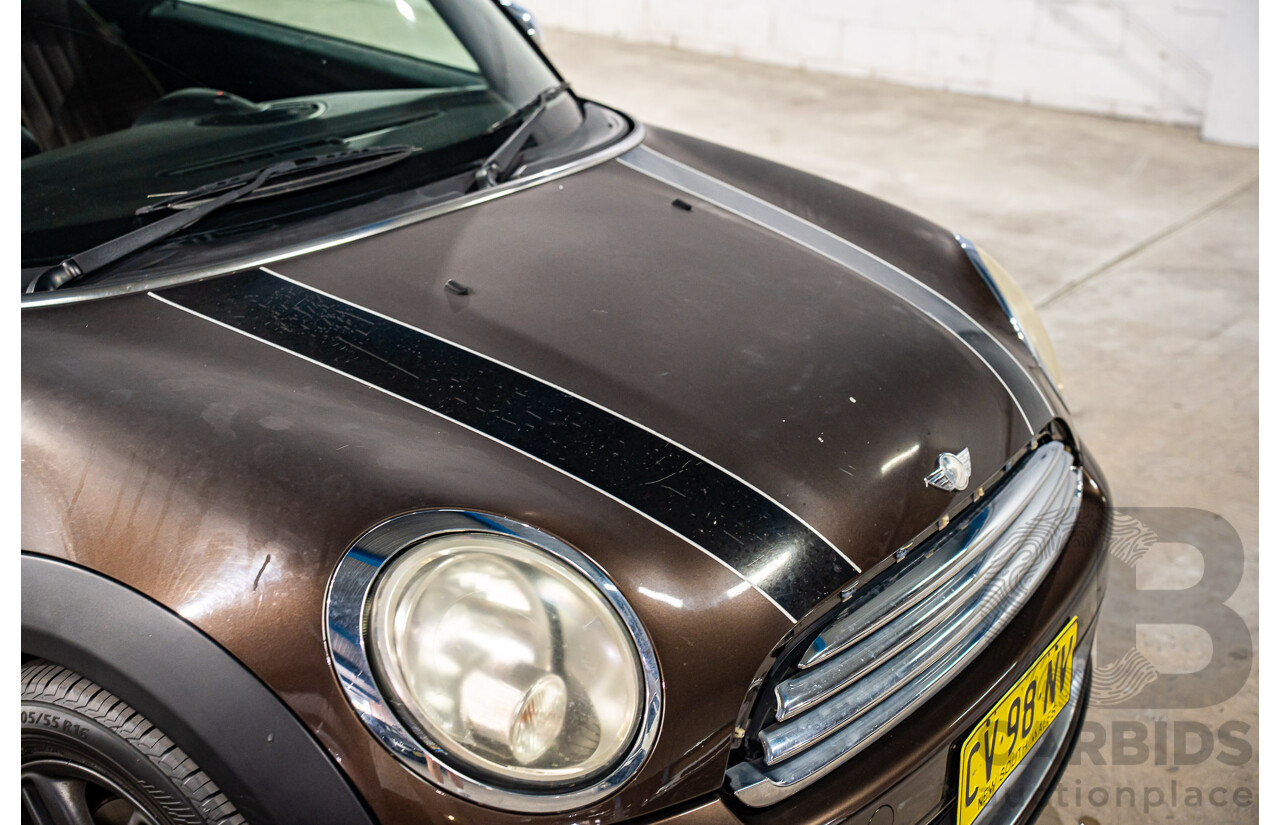 1/2012 Mini Cooper Cabrio R57 MY12 2d Convertible Hot Chocolate Metallic 1.6L