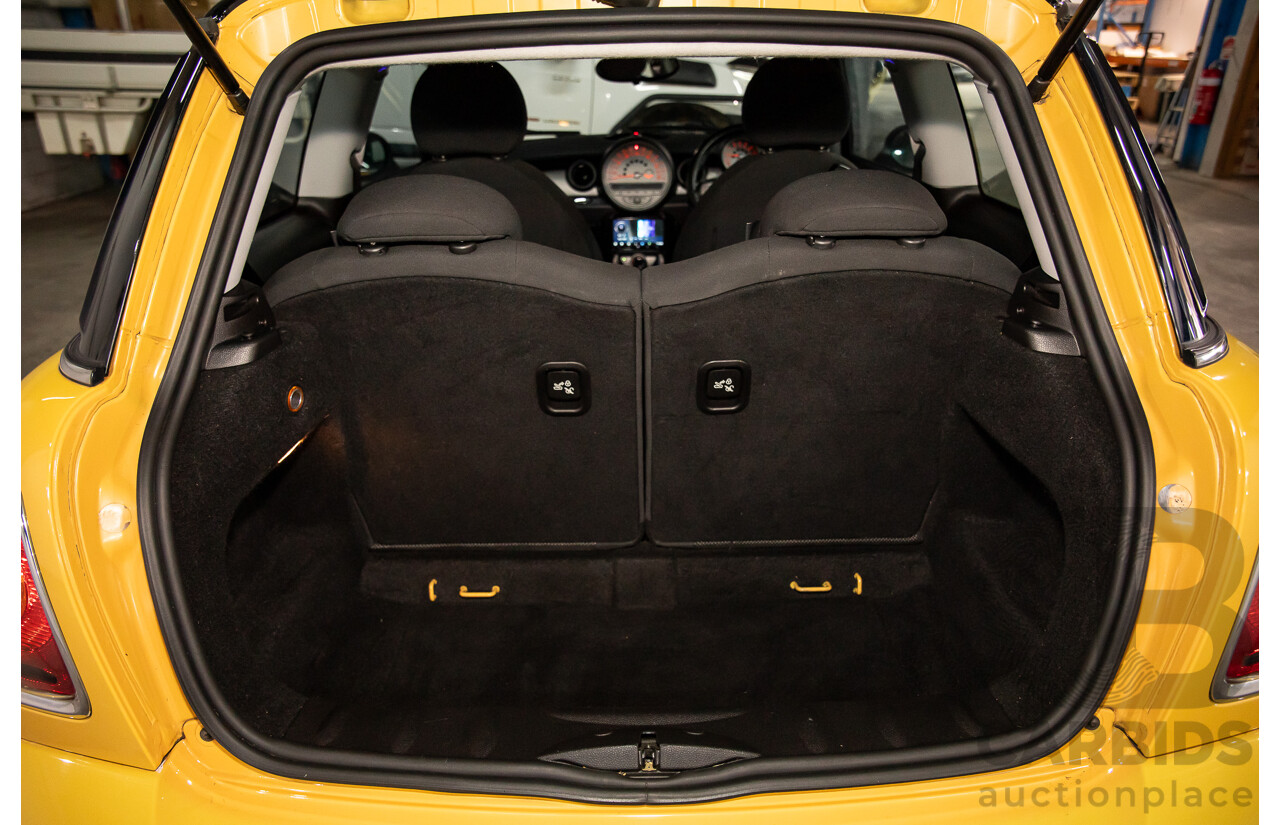 8/2009 Mini Cooper R56 2d Hatchback Mellow Yellow 1.6L