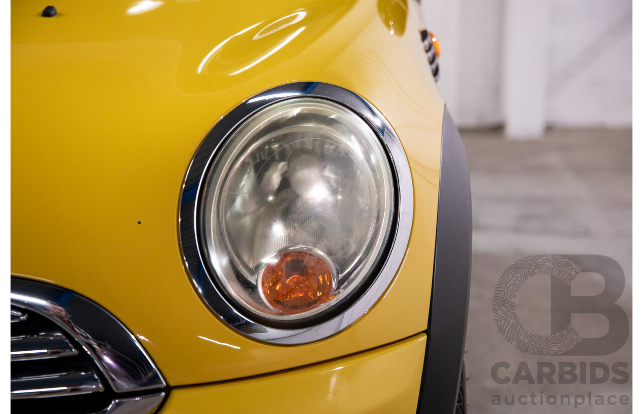 8/2009 Mini Cooper R56 2d Hatchback Mellow Yellow 1.6L