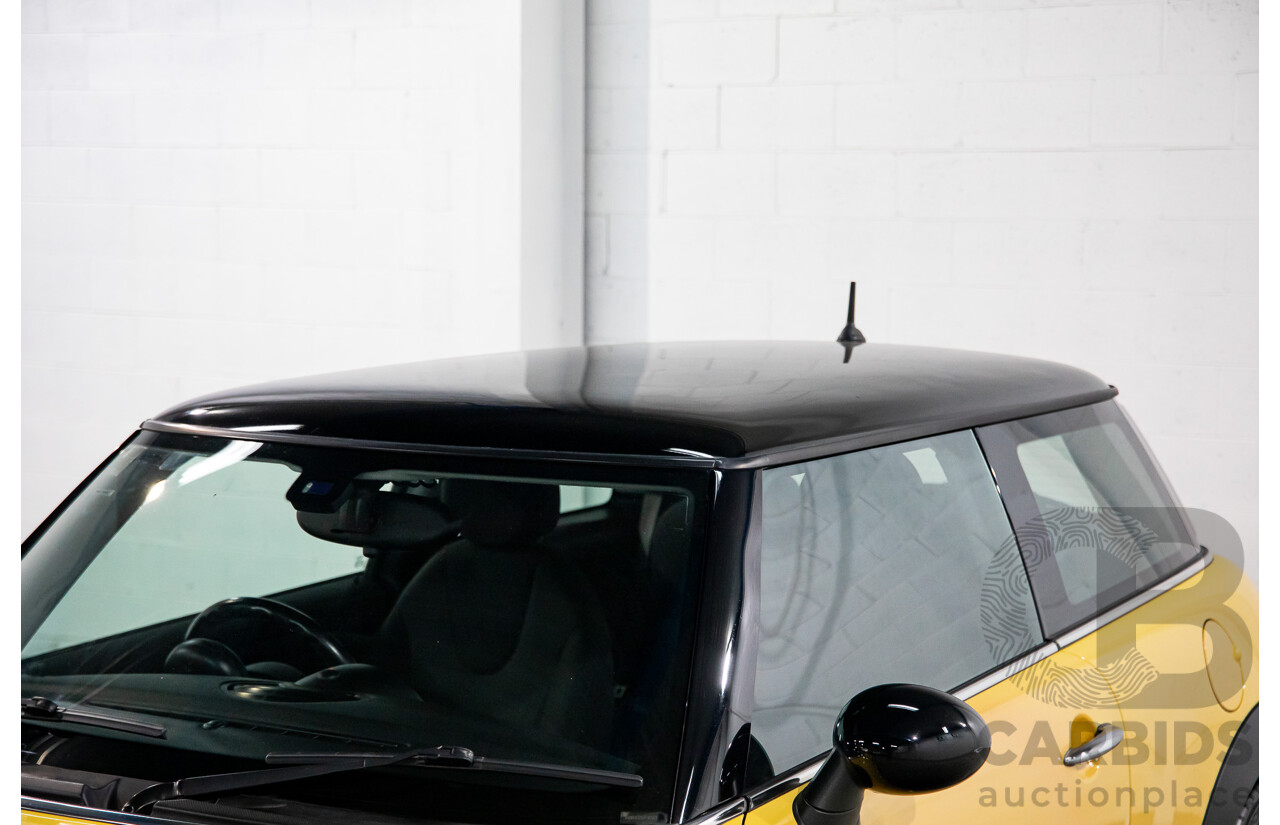 8/2009 Mini Cooper R56 2d Hatchback Mellow Yellow 1.6L