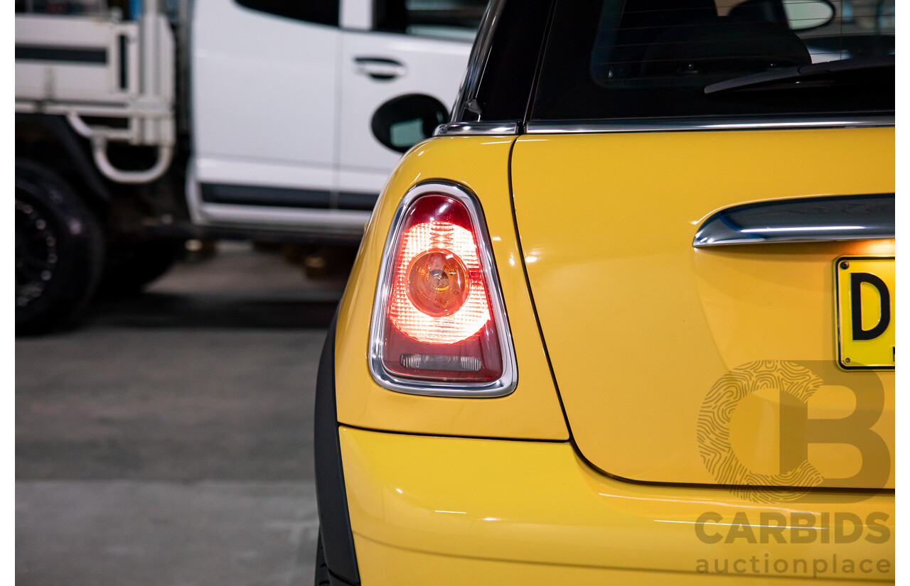 8/2009 Mini Cooper R56 2d Hatchback Mellow Yellow 1.6L