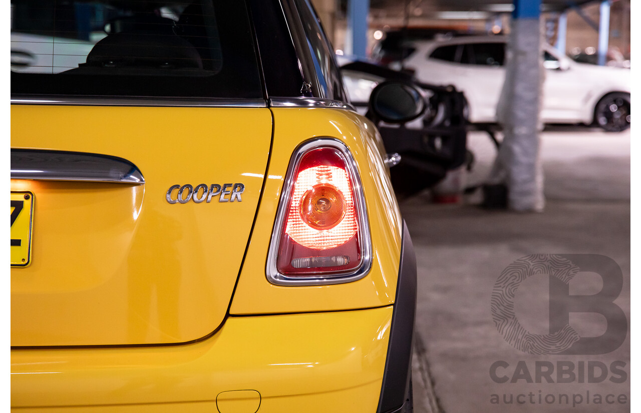 8/2009 Mini Cooper R56 2d Hatchback Mellow Yellow 1.6L