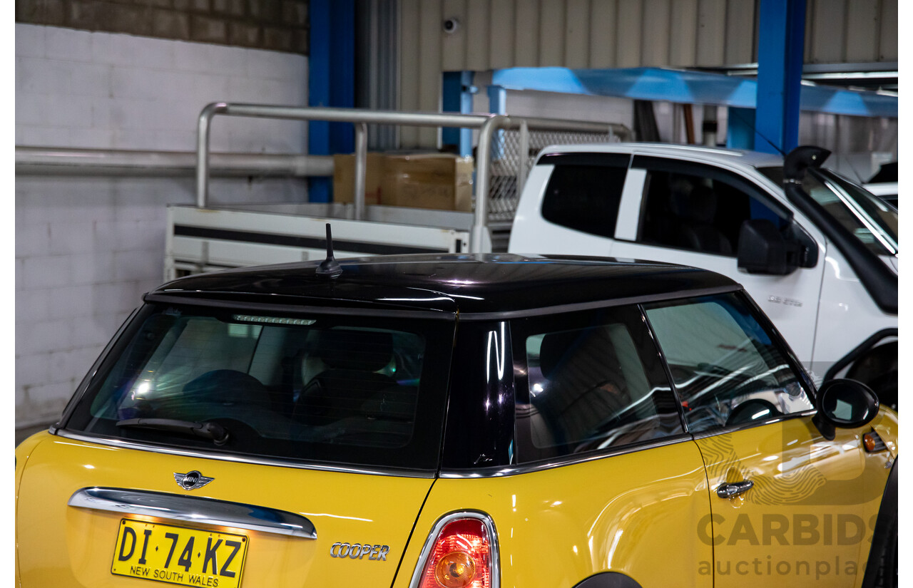 8/2009 Mini Cooper R56 2d Hatchback Mellow Yellow 1.6L