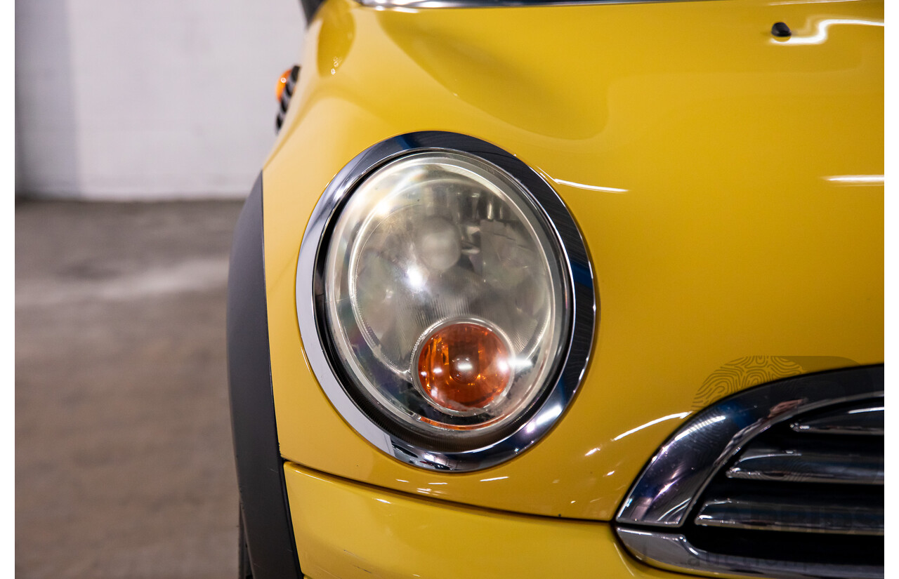8/2009 Mini Cooper R56 2d Hatchback Mellow Yellow 1.6L