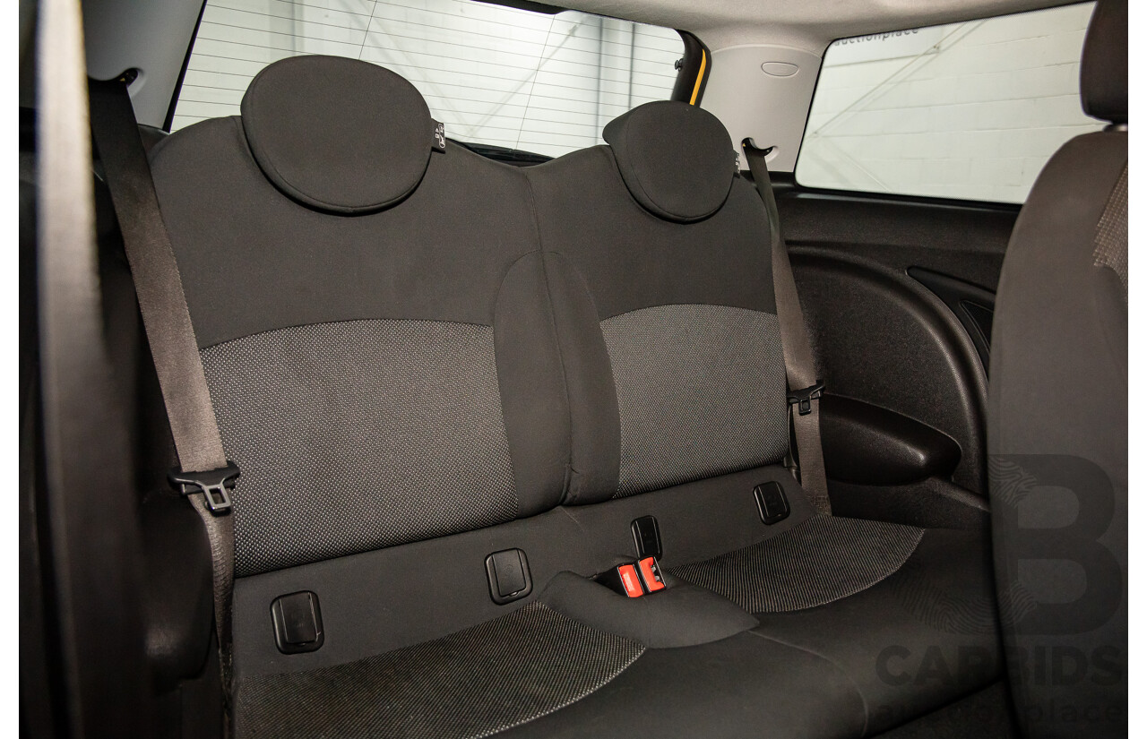 8/2009 Mini Cooper R56 2d Hatchback Mellow Yellow 1.6L