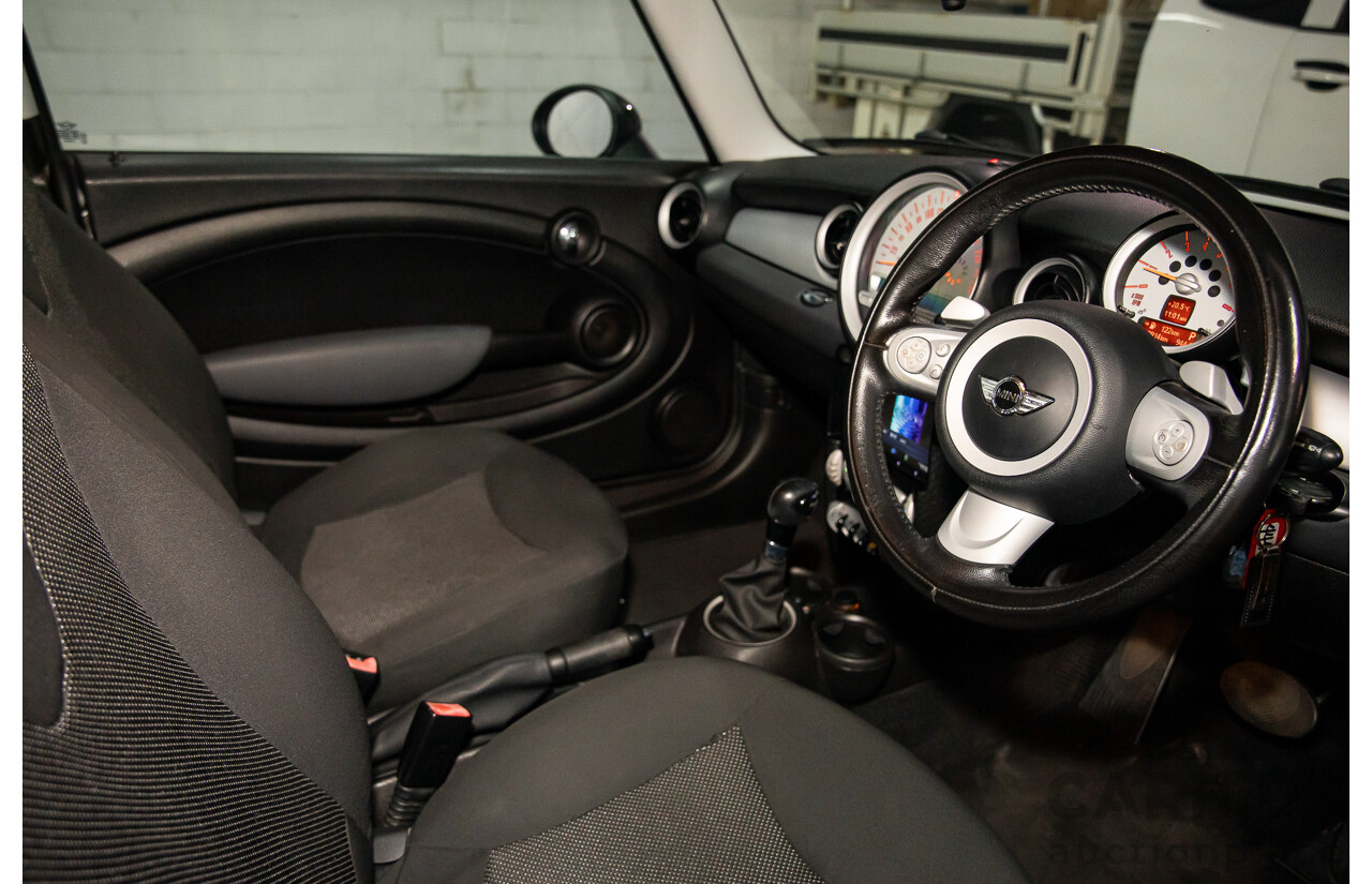 8/2009 Mini Cooper R56 2d Hatchback Mellow Yellow 1.6L