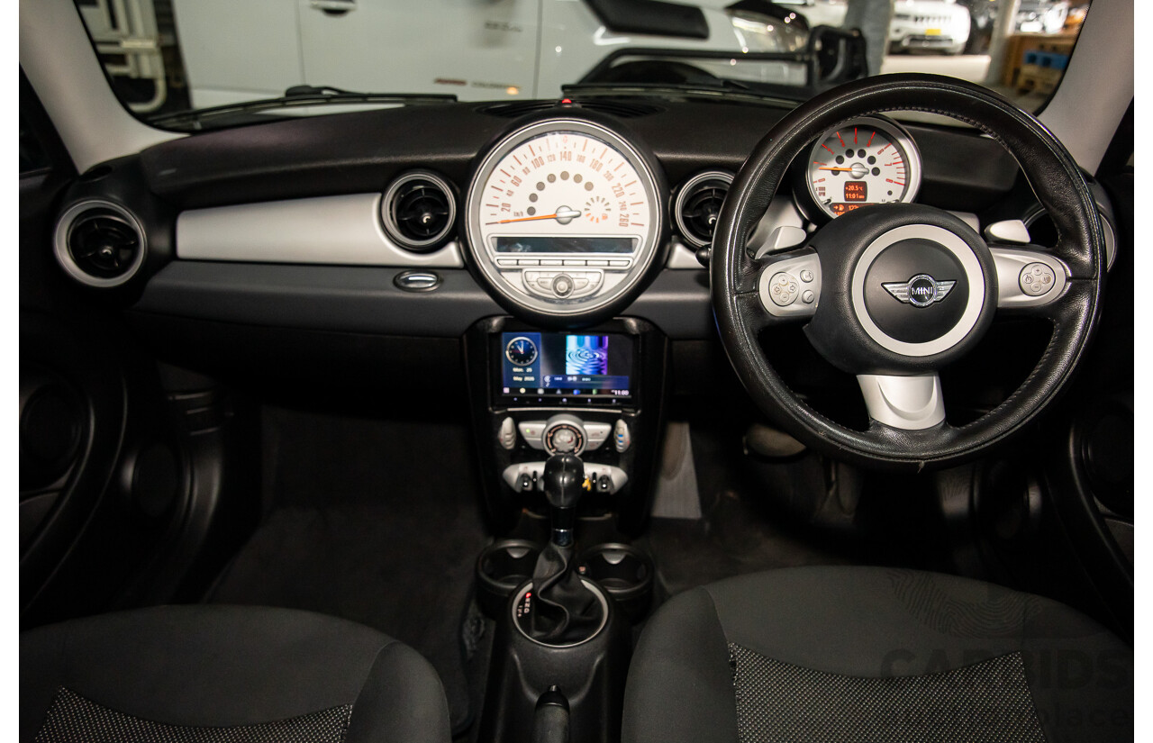 8/2009 Mini Cooper R56 2d Hatchback Mellow Yellow 1.6L