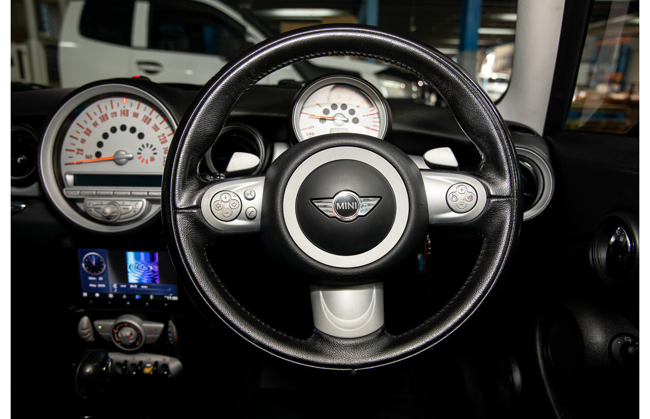 8/2009 Mini Cooper R56 2d Hatchback Mellow Yellow 1.6L