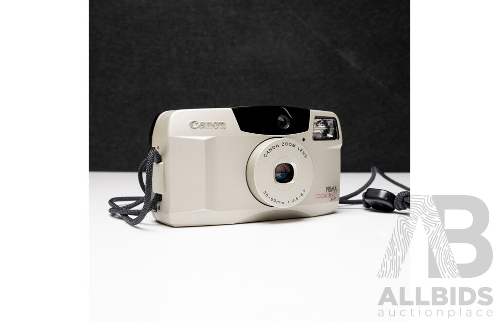 Canon Prima Zoom Shot 35mm Compact Film Camera with Canon Pouch