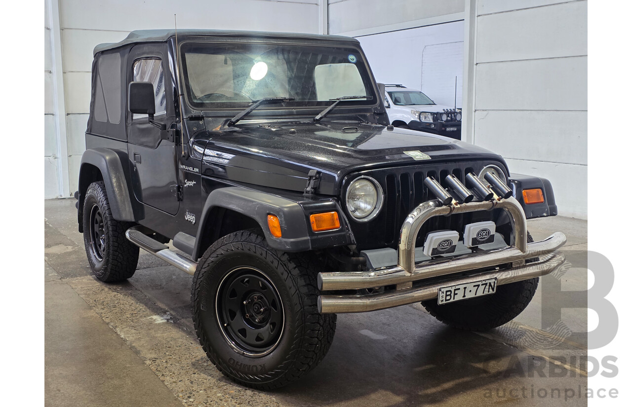10/2002 Jeep Wrangler Sport (4x4) TJ 2d Softtop Black V6 4.0L