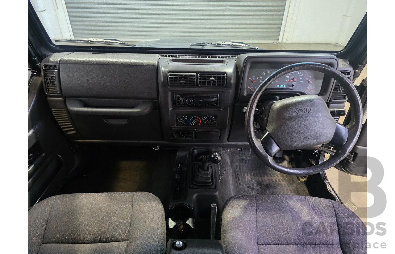 10/2002 Jeep Wrangler Sport (4x4) TJ 2d Softtop Black V6 4.0L