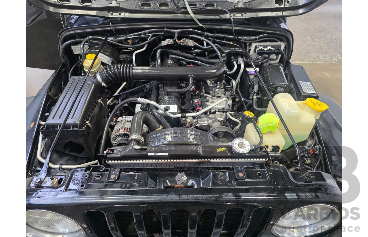 10/2002 Jeep Wrangler Sport (4x4) TJ 2d Softtop Black V6 4.0L