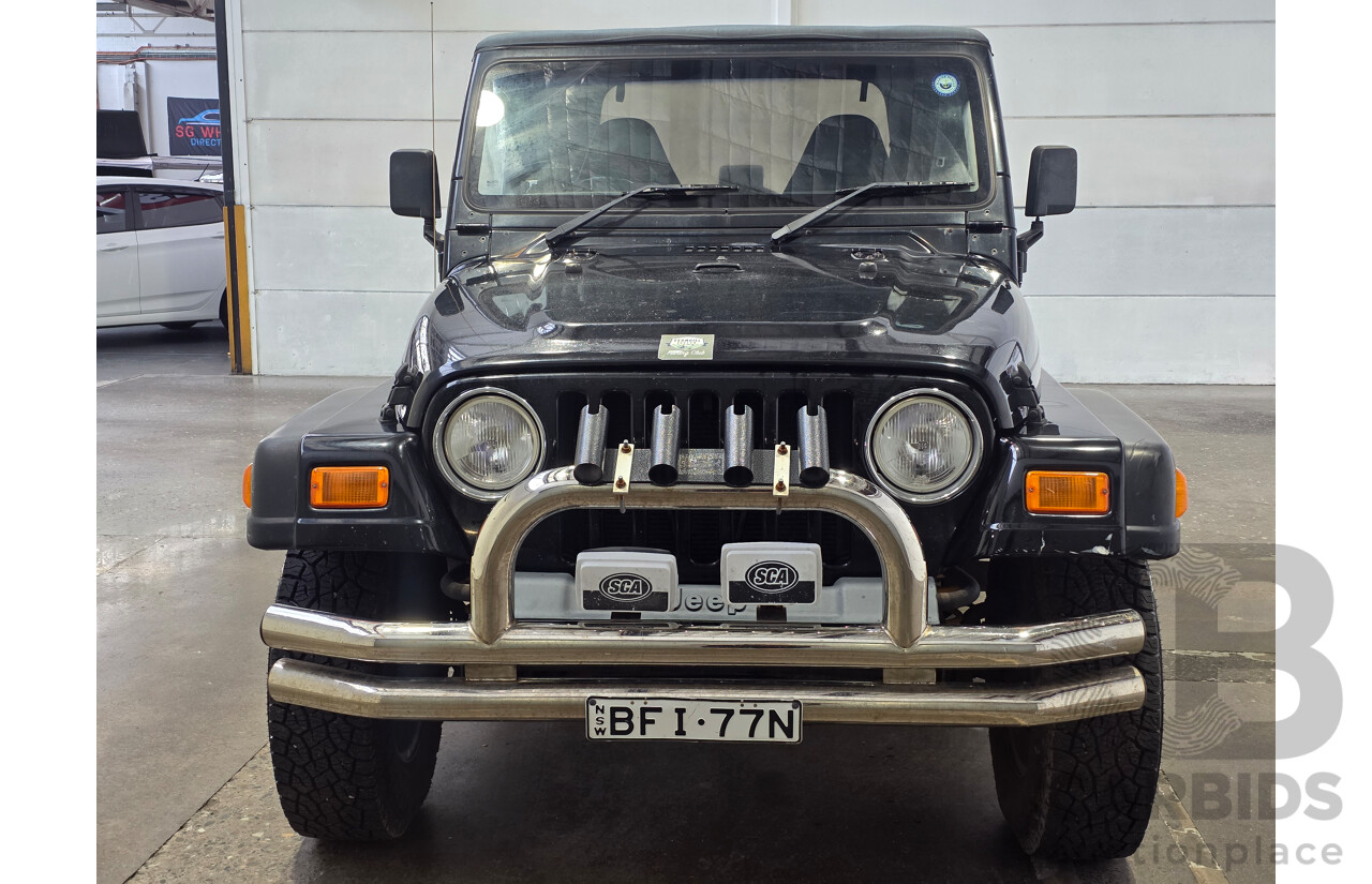 10/2002 Jeep Wrangler Sport (4x4) TJ 2d Softtop Black V6 4.0L