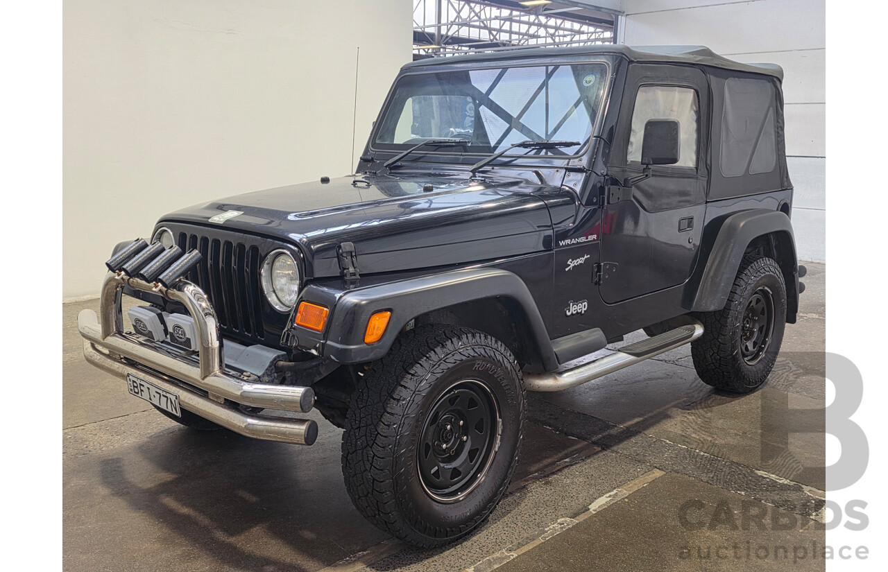 10/2002 Jeep Wrangler Sport (4x4) TJ 2d Softtop Black V6 4.0L