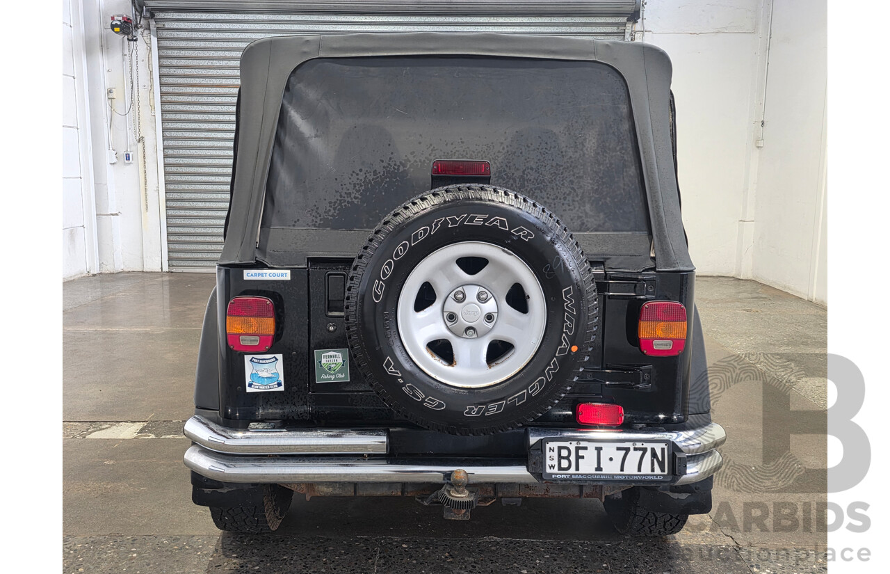 10/2002 Jeep Wrangler Sport (4x4) TJ 2d Softtop Black V6 4.0L