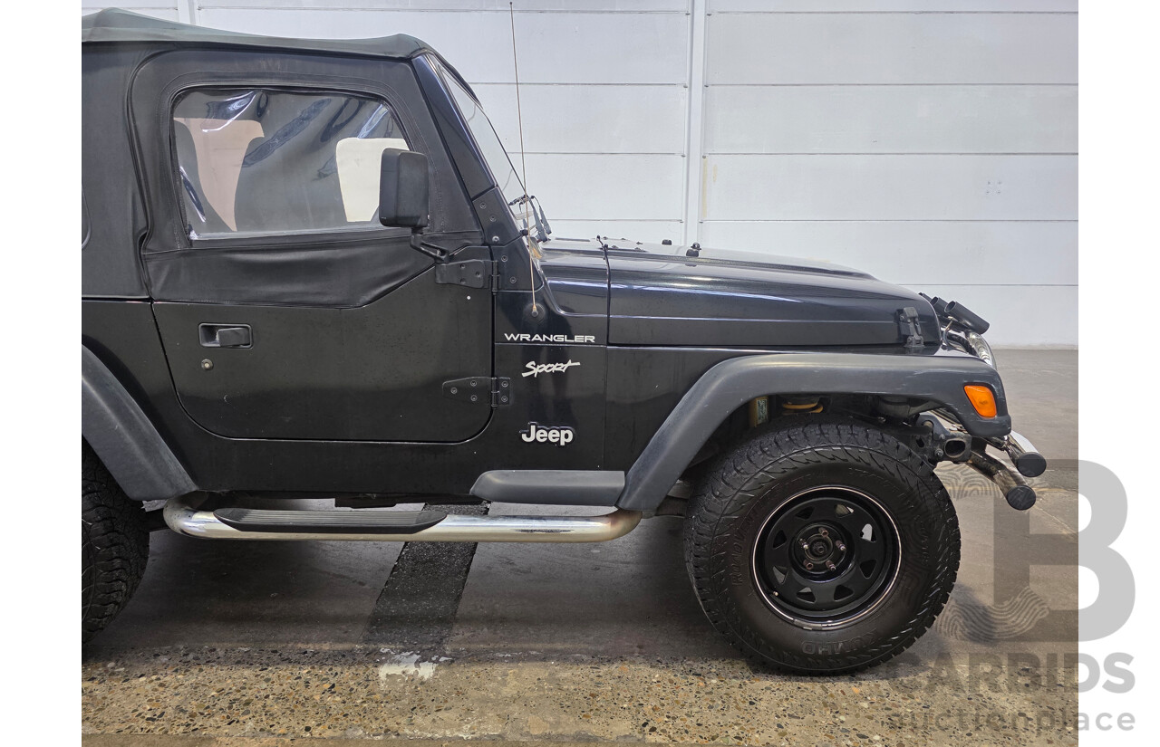 10/2002 Jeep Wrangler Sport (4x4) TJ 2d Softtop Black V6 4.0L