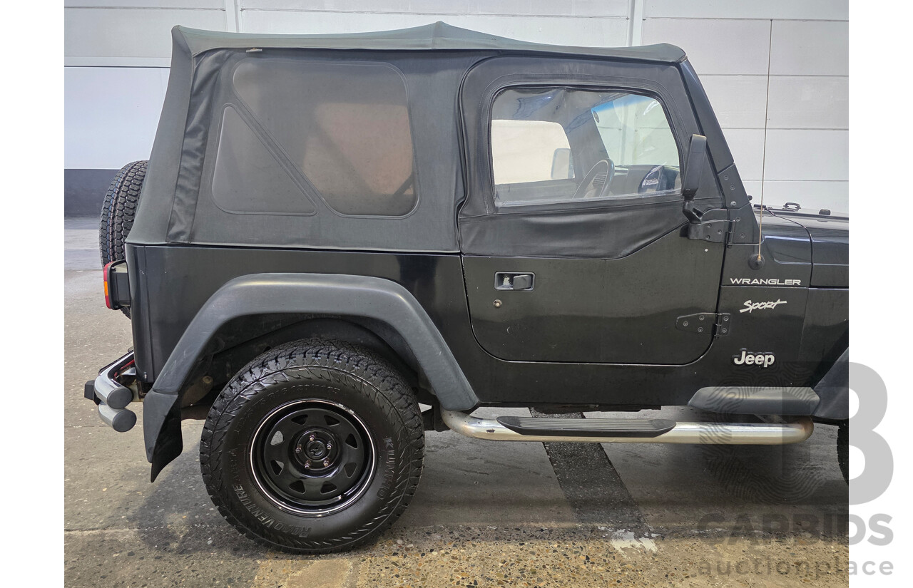 10/2002 Jeep Wrangler Sport (4x4) TJ 2d Softtop Black V6 4.0L