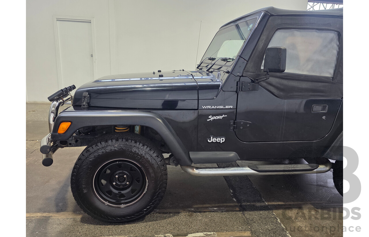 10/2002 Jeep Wrangler Sport (4x4) TJ 2d Softtop Black V6 4.0L