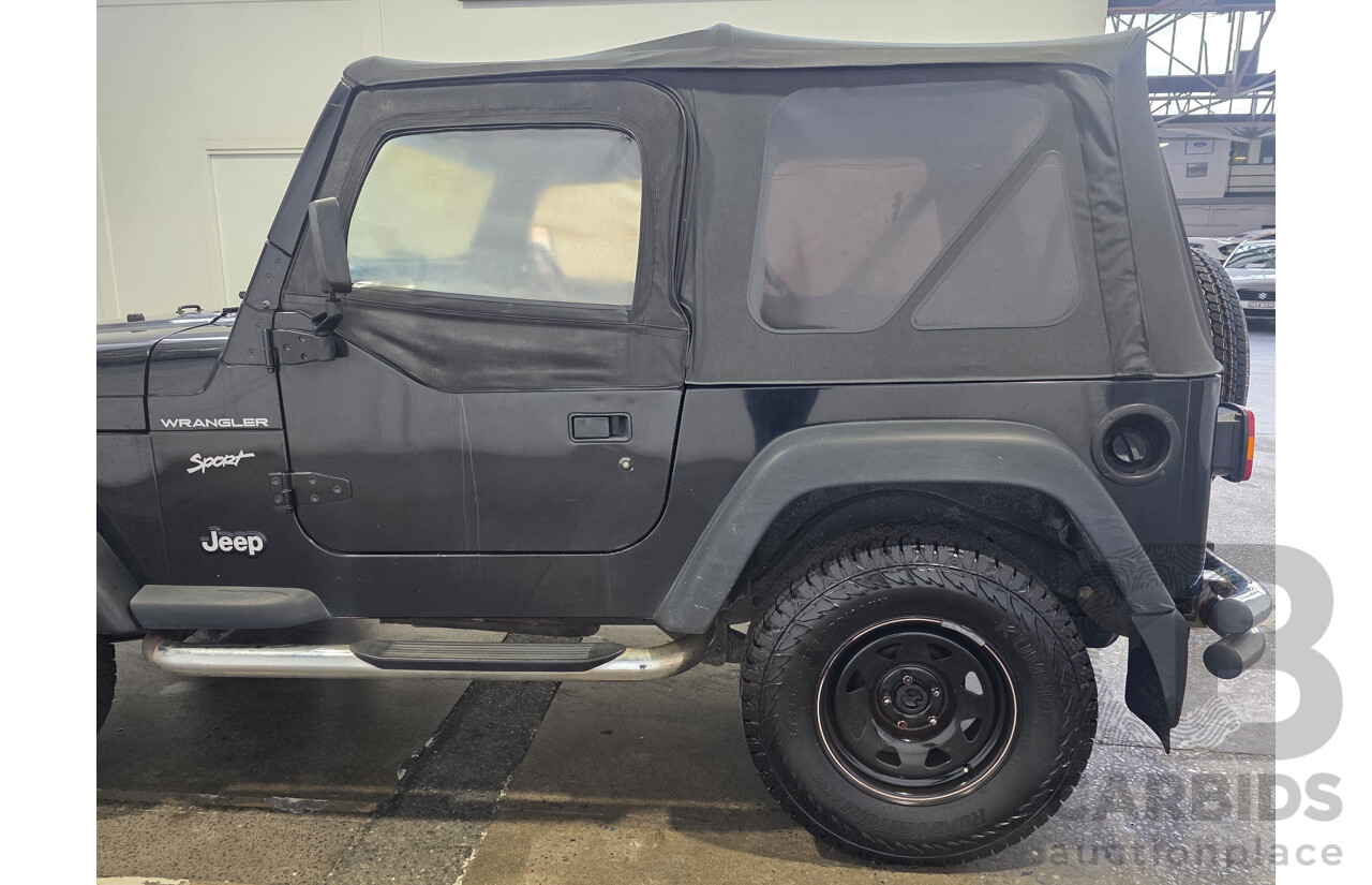 10/2002 Jeep Wrangler Sport (4x4) TJ 2d Softtop Black V6 4.0L