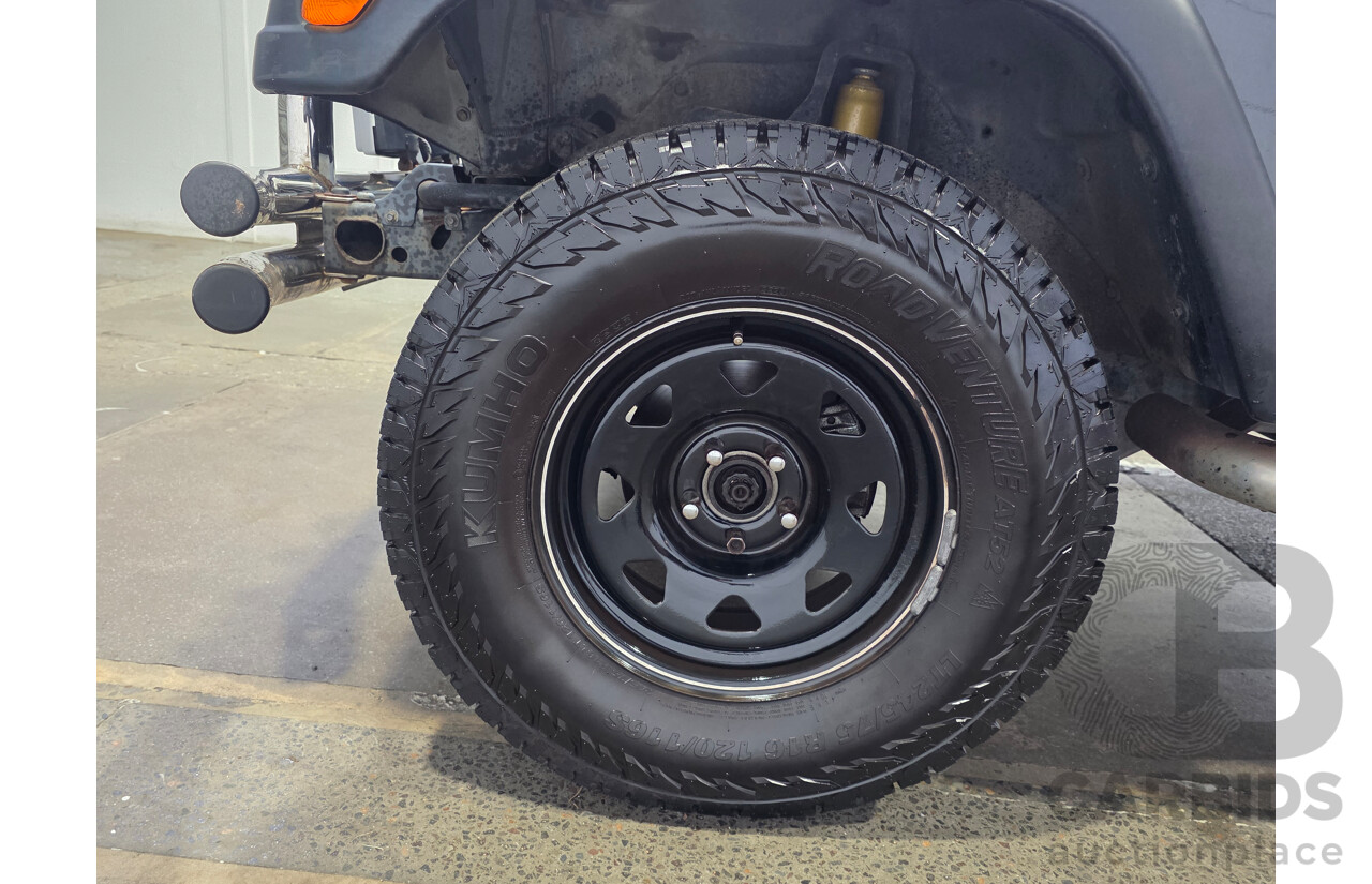 10/2002 Jeep Wrangler Sport (4x4) TJ 2d Softtop Black V6 4.0L