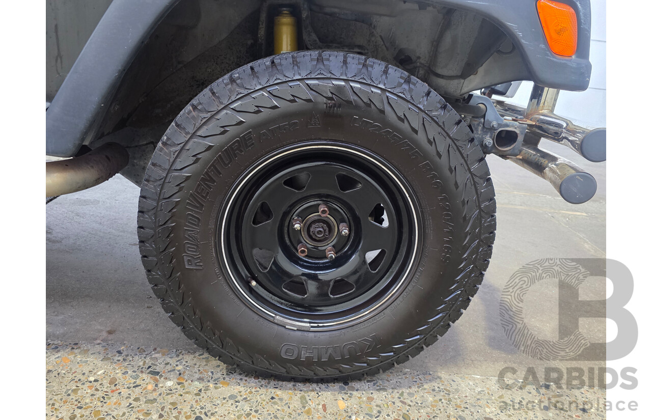 10/2002 Jeep Wrangler Sport (4x4) TJ 2d Softtop Black V6 4.0L