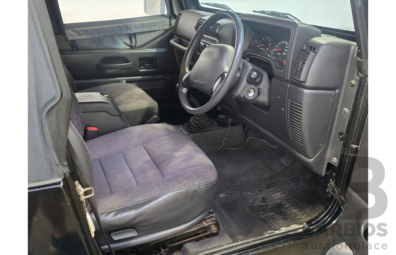 10/2002 Jeep Wrangler Sport (4x4) TJ 2d Softtop Black V6 4.0L