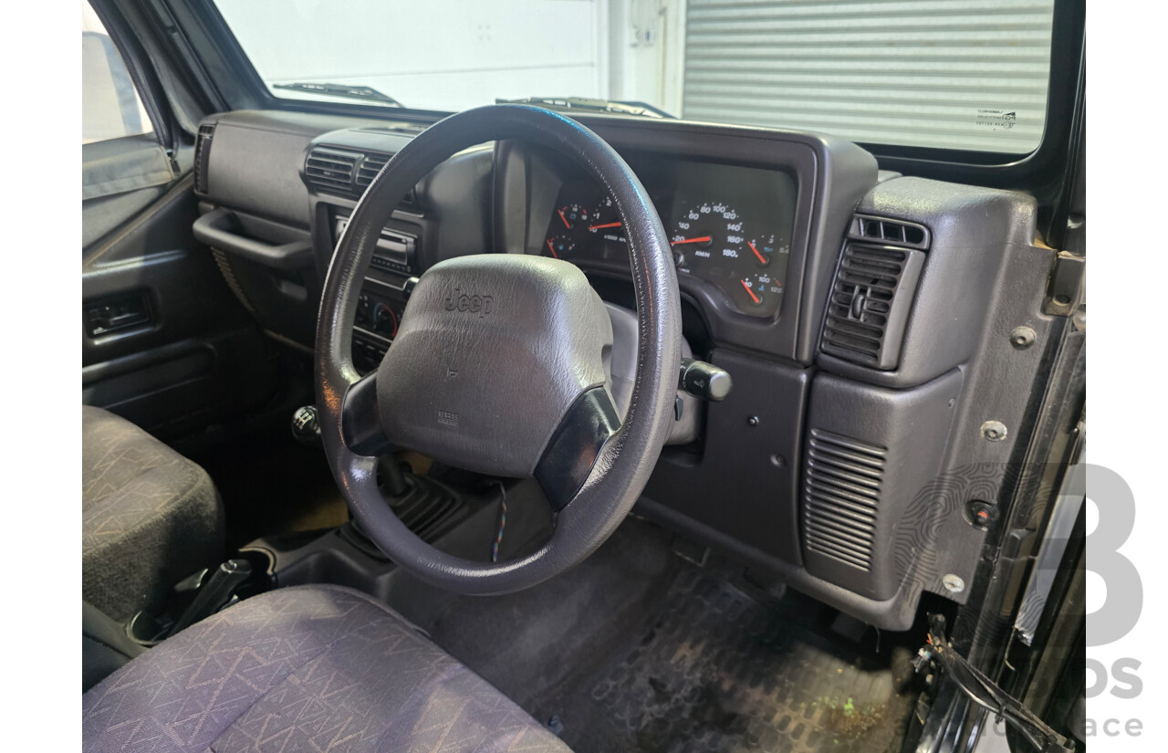 10/2002 Jeep Wrangler Sport (4x4) TJ 2d Softtop Black V6 4.0L