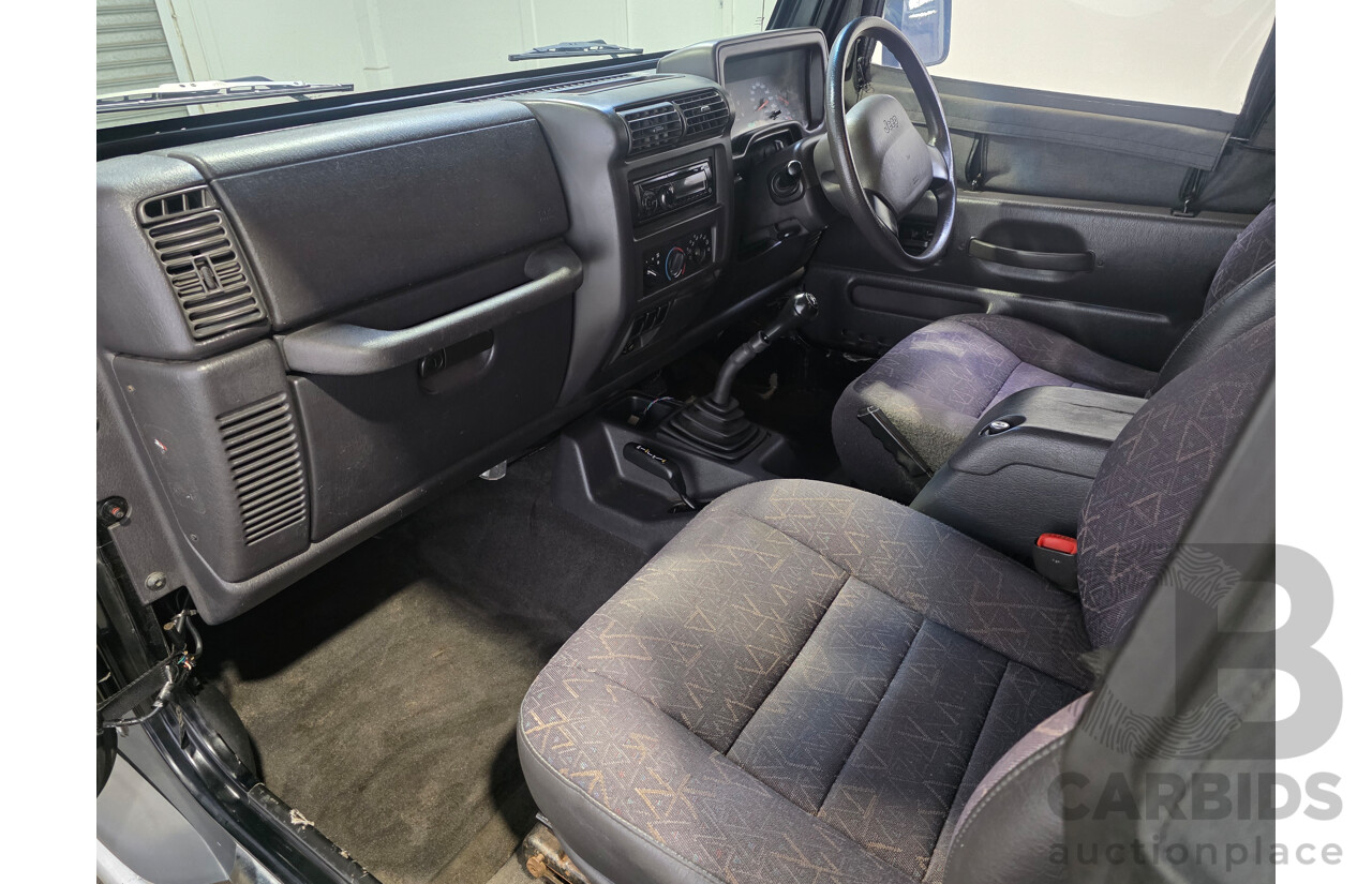 10/2002 Jeep Wrangler Sport (4x4) TJ 2d Softtop Black V6 4.0L